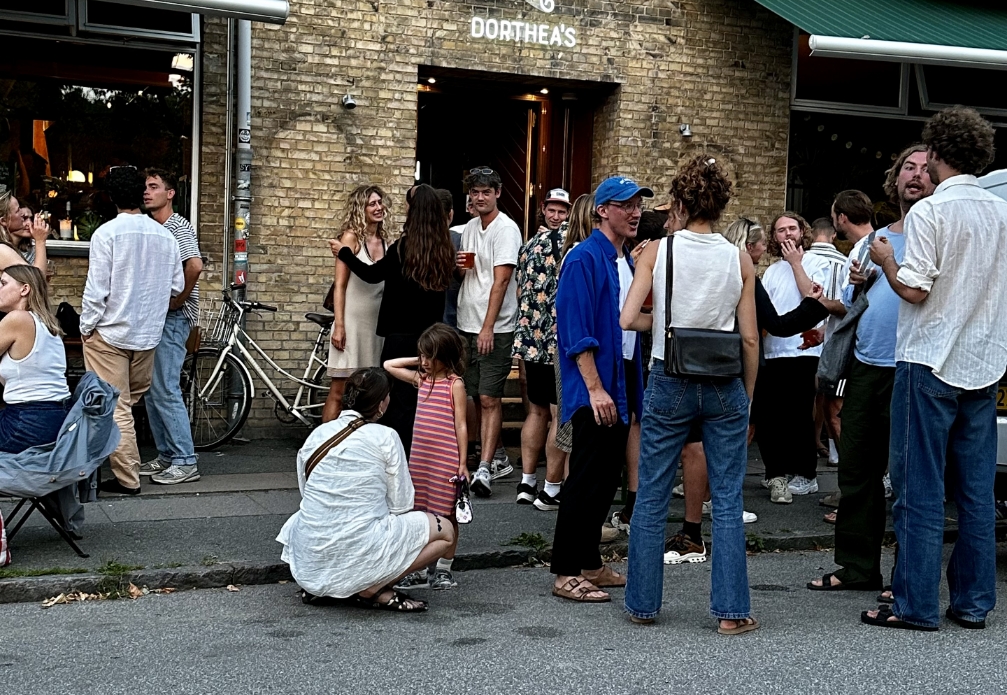 people in front of bar