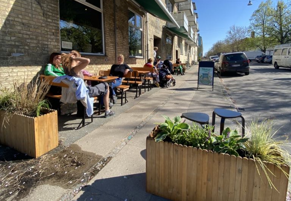 people sitting on bar terrace